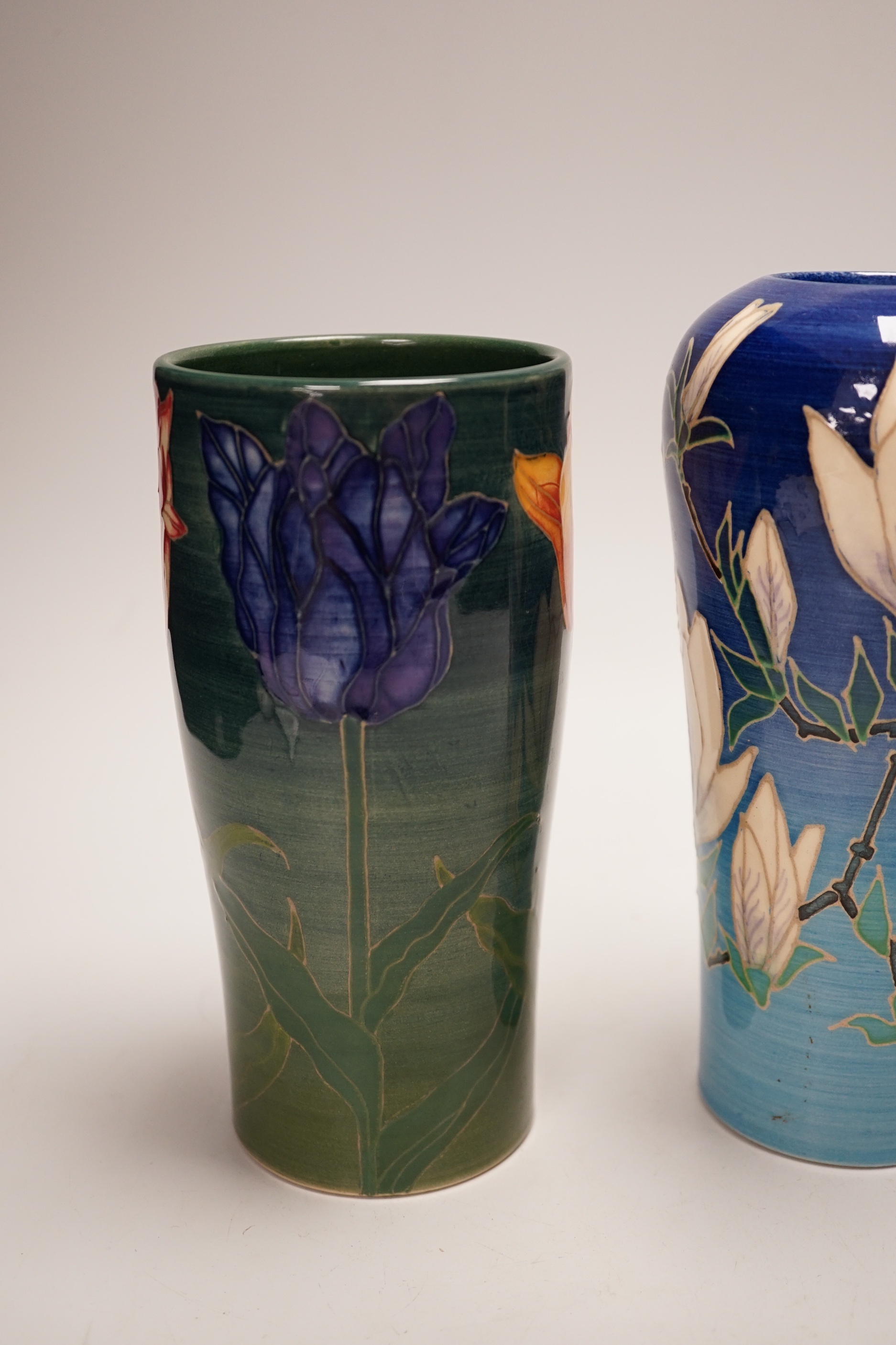 Sally Tuffin for Dennis China Works - three floral design vases, 20cm